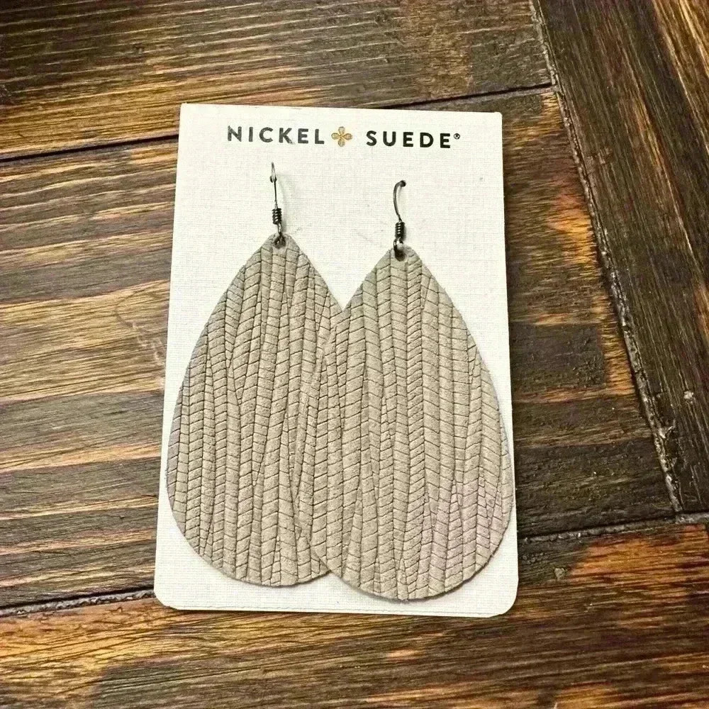 Cream Teardrop Earrings with Textured Pattern by Nickel and Suede